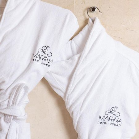 Marina Hotel Kuwait City Exterior photo A bathrobe