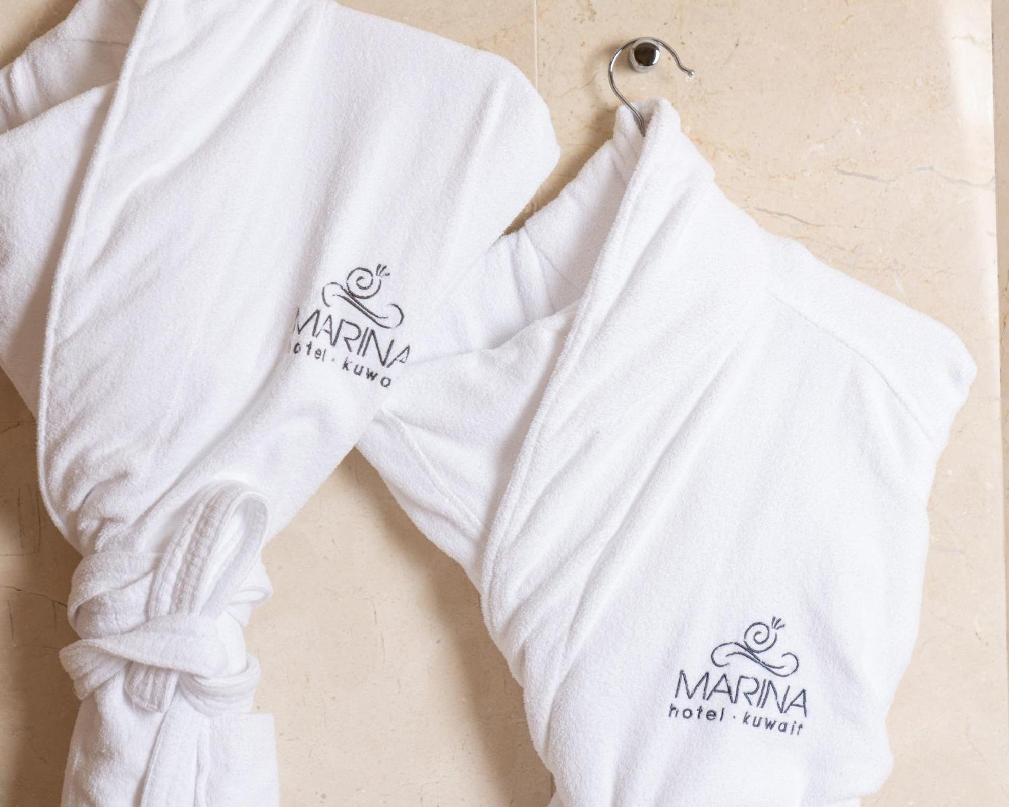 Marina Hotel Kuwait City Exterior photo A bathrobe